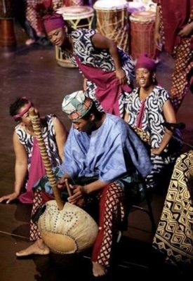 what functions did music serve in medieval west africa? And how does the tradition of storytelling through music still resonate with us today?